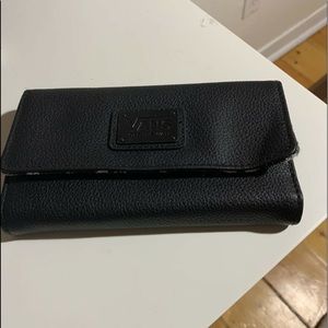 Porte-feuille vans très peu utiliser en bonn état